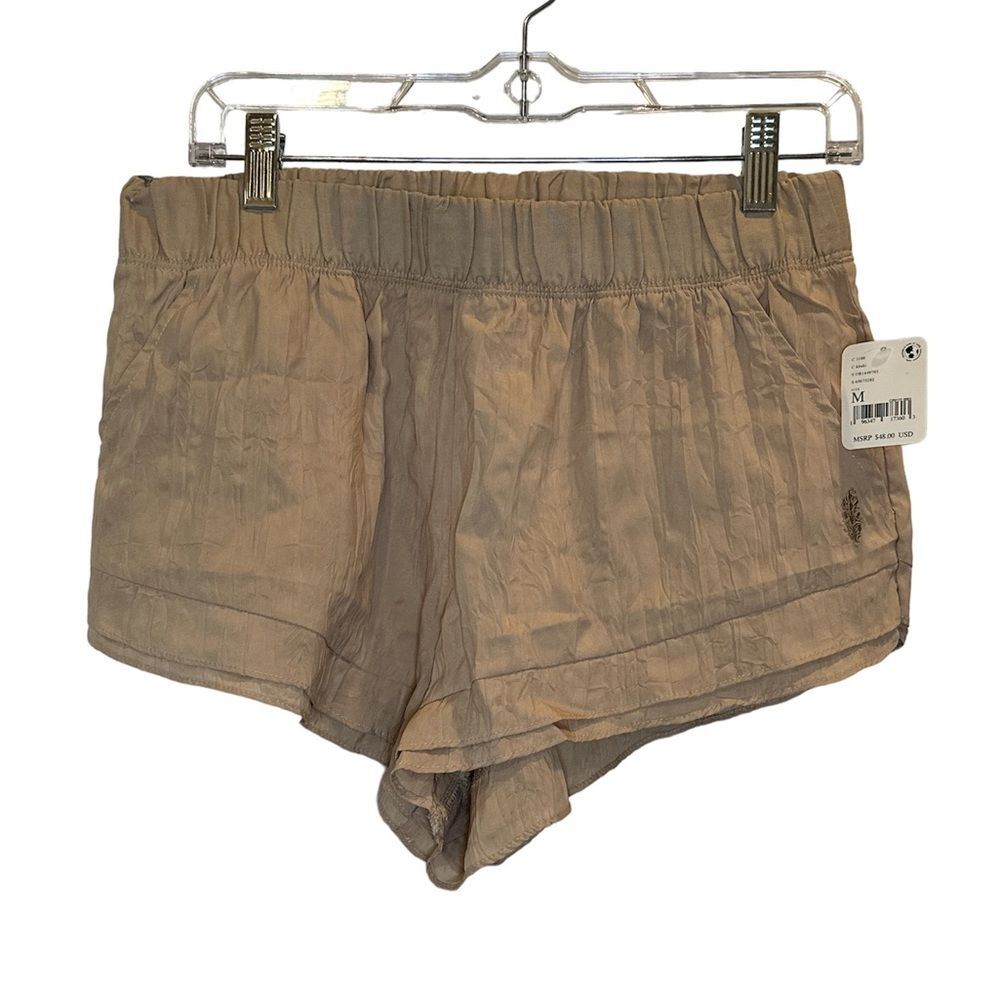 Free people movement NWT beige low rise shorts Size Medium